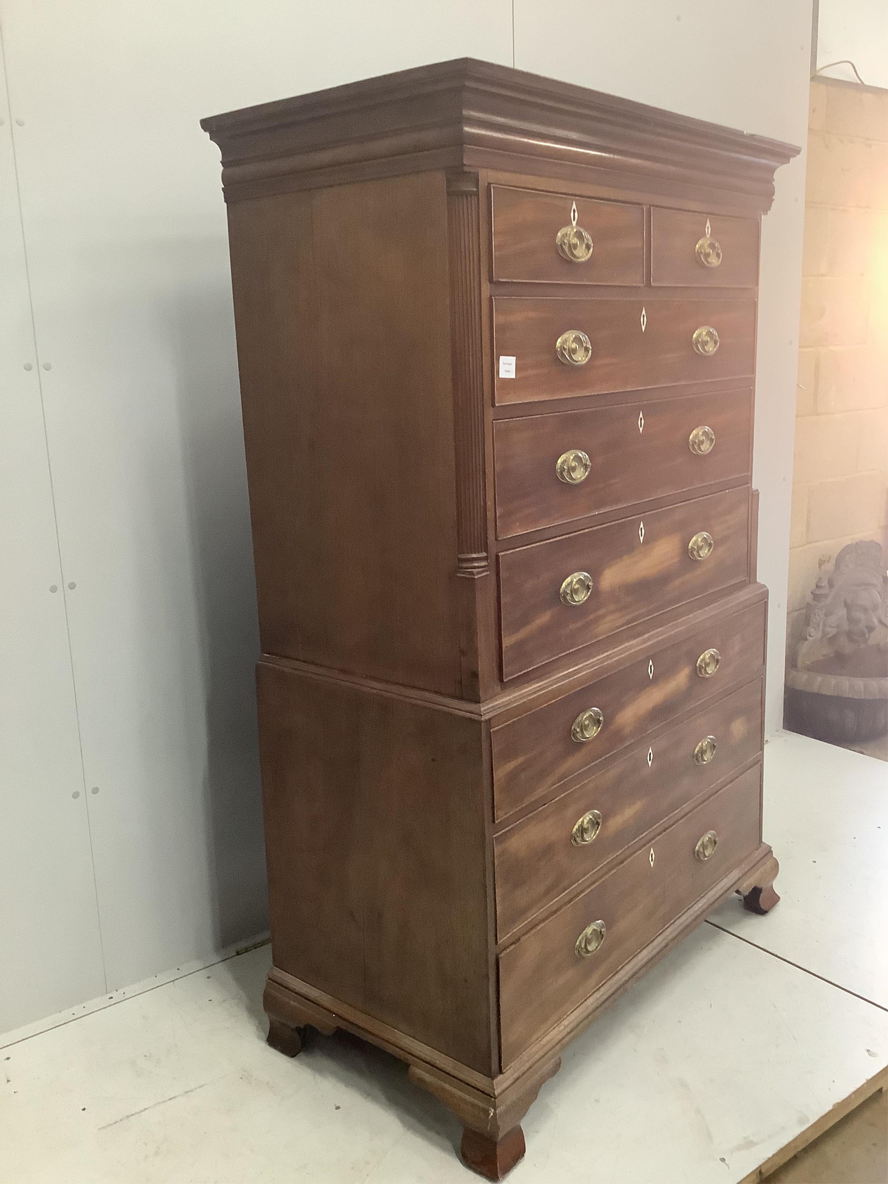 A George III mahogany chest on chest, width 111, depth 58cm, height 174cm. Condition - fair